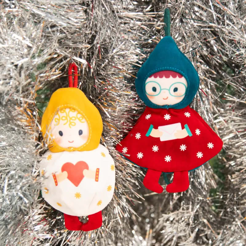 Gioco per bambini a forma di elfo fosforescente reversibile che diventa un albero di Natale
